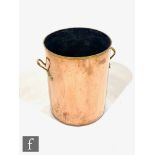 A large two handle cylindrical copper log bin, brass dot border, height 50cm.