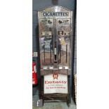 A post 1950s Embassy chrome plated floor standing cigarette dispenser, the arch top with illuminated