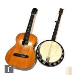 A Melody-Jo five string banjo and an acoustic guitar by Georgian. (2)