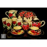 A 1930s / 1950s Ditmar-Urbach tea for two comprising globular teapot, two teacups and saucers, two