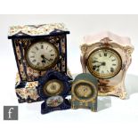 A late 19th Century Japan patterned transfer printed mantle clock, a similar Ansonia example with