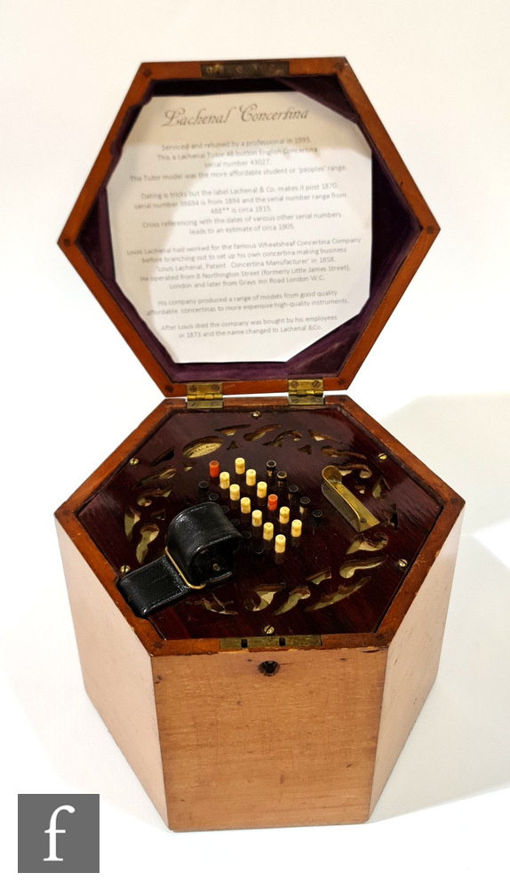 A concertina by Lachenal, serial no 43027, forty eight buttons, in octagonal mahogany case, height