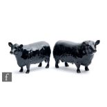 Two Beswick cattle comprising Aberdeen Angus Bull model 1562 and Aberdeen Angus Cow model 1563, both