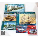 Seven assorted plastic model kits of various scales and manufacturers, mostly military related, by