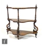 A 19th Century rosewood three tier what not, serpentine front on turned a scroll supports, A/F,