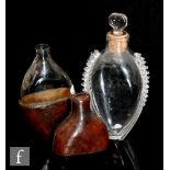 A 19th Century clear crystal flask of compressed tear form with applied rigger work to the shoulders