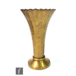 A 1930s bronze vase of footed and flared form with a fluted body and scalloped rim, unmarked, height