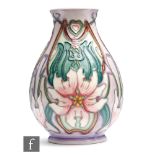 A Moorcroft Pottery vase decorated in the Blakeney Mallow pattern designed by Sarah Brummel-