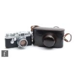A 1959 Ernst Leitz Wetzlar Leica IIIG rangefinder camera, chrome, serial Nr. 980603, with Ernst