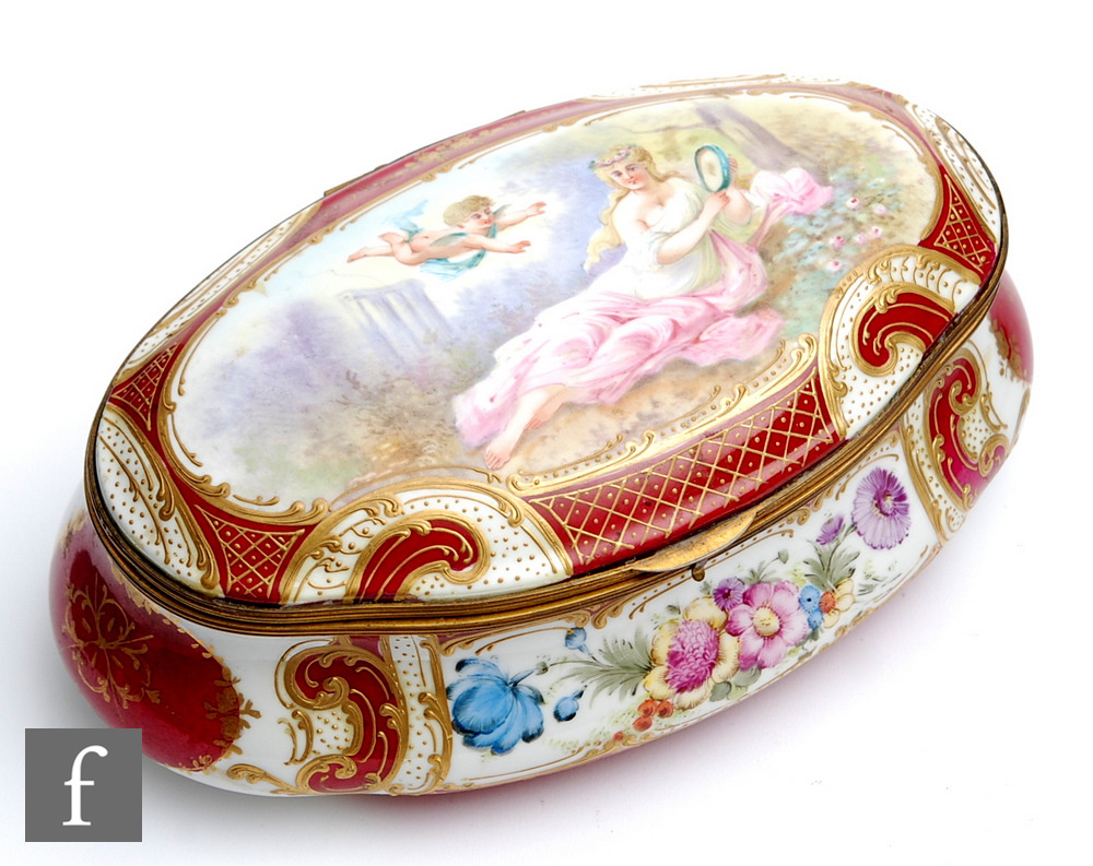 A continental oval table casket decorated to the cover with a lady in white and pink robes