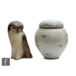 A contemporary studio pottery model of an owl with brown painted detailing, unmarked, height 21cm,