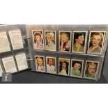 A cigarette card album containing Gallaher Portraits of Famous Stars set of forty eight, Film