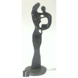 Manner of Henry Moore - Mother and Child, patinated bronze, height 23cm.