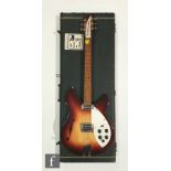 A Rickenbacker Model 1993 electric guitar manufactured in 1987, made in USA, fireglo finish and