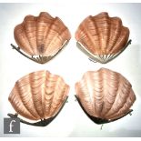 A group of four 1930s Art Deco pink frosted glass clam shell wall lights with fan form chrome