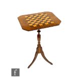 A Victorian walnut tripod occasional table with chequer inlaid top, on splayed legs, width 48cm.