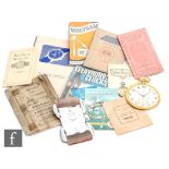 A small parcel lot of watch related ephemera to include an Omega paper pocket watch with Figures