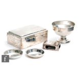 Five items of hallmarked silver to include a cigarette box, a match box cover, two pin dishes and