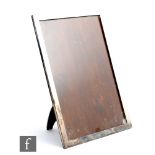 A hallmarked silver easel photograph frame of plain form, height 41cm, width 29cm, to original