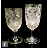 A late 19th Century Stourbridge crystal wine glass with large round funnel bowl engraved with