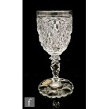 A later 19th Century Thomas Webb & Sons clear crystal drinking glass, the ovoid bowl decorated