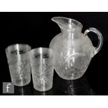 A late 19th Century Stevens and Williams lemonade set, circa 1887, comprising an ovoid jug with