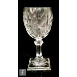 A later 19th Century Thomas Webb & Sons rock crystal drinking glass, the ovoid bowl decorated with