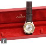 A gentleman's Omega Seamaster quartz wrist watch, batons, day and date facility to a gold and