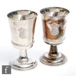 A pair of hallmarked silver Royal Wedding commemorative goblets each detailed with Prince of Wales