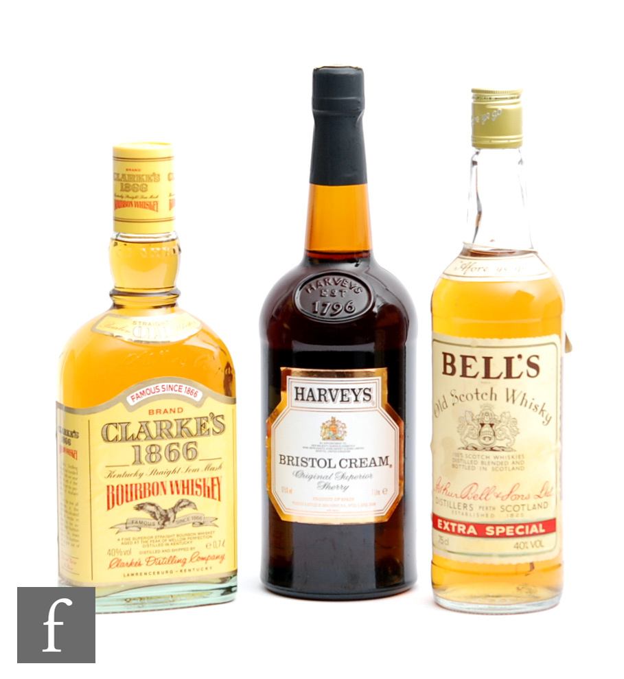 A bottle of Clarkes 1866 Bourbon whiskey, 70cl, a bottle of Bell's, 75cl, and litre bottle of