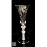 An 18th Century ale glass circa 1755, the elongated bell bowl above a multi spiral airtwist stem