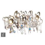 A parcel lot of Scandinavian silver and white metal souvenir spoons to include enamelled and