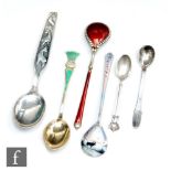 Six items of Danish silver flat ware to include a Georg Jensen condiment spoon, three enamelled