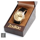 A mid 20th Century gold plated gentleman's Zodiac automatic Goldenline wrist watch, batons and day/