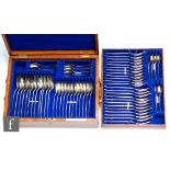 An oak cased canteen of hallmarked silver old English pattern cutlery for twelve place settings