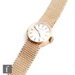 A lady's 9ct hallmarked Certina wrist watch, batons to a circular silvered dial, all to an