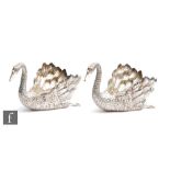 A pair of Italian silver table decorations modelled as swans, total weight 15.5oz, length 18cm, each