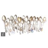 A parcel lot of assorted hallmarked silver souvenir and sporting related tea spoons to include