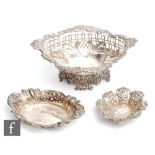 Three late 19th to early 20th Century bon bon dishes with pierced and embossed foliate decoration,