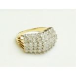 A fine diamond Cluster Ring, with five rows of round brilliant cut diamonds, 15 in all, approx. 1.