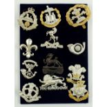 Militaria: A collection of brass and cast Replica Cap Badges, for various British Army Regiments,