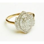 A diamond and 9ct gold navette shaped Cluster Ring, set with alternate rows of round brilliant cut