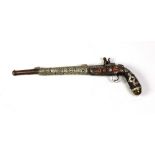 A late 18th Century / early 19th Century Middle Eastern flintlock long barrel Pistol, with pierced