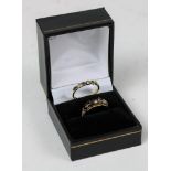 An elegant Ladies Ring, of slim design set with blue sapphire and diamonds; together with a 9ct gold