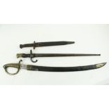 A 19th Century brass hilted French curved short Sword, the blade stamed AA (crowned) A1587, and in