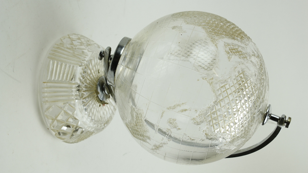 A Waterford crystal etched model of a Globe of the World, on shaped base. (1)