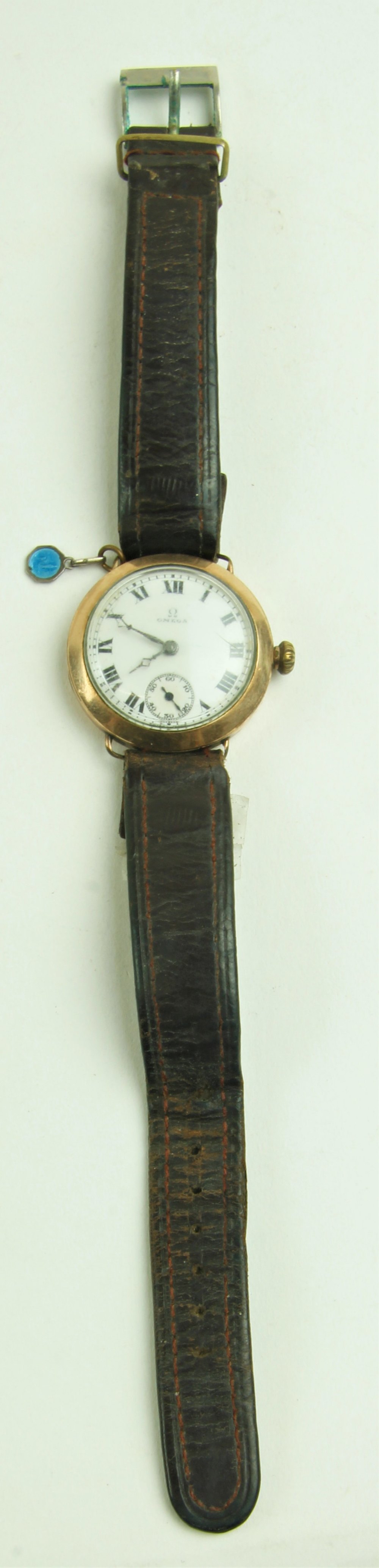 A 1930's Gentleman's Wrist Watch, with gold frame by "Omega" with original leather strap, and enamel