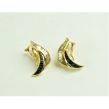 A pair of Channel Set, tapered baguette 18ct (7g) Ear Rings, with 24 (0.6) approx. 1.44 ct.