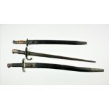 A Swedish ? Remington Rolling Block Rifle Bayonet, 22 3/4" blades, and original leather scabbard;