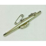 A silver and gold Brooch, with five stone ring mount set with five old cut diamonds (approx. .7ct